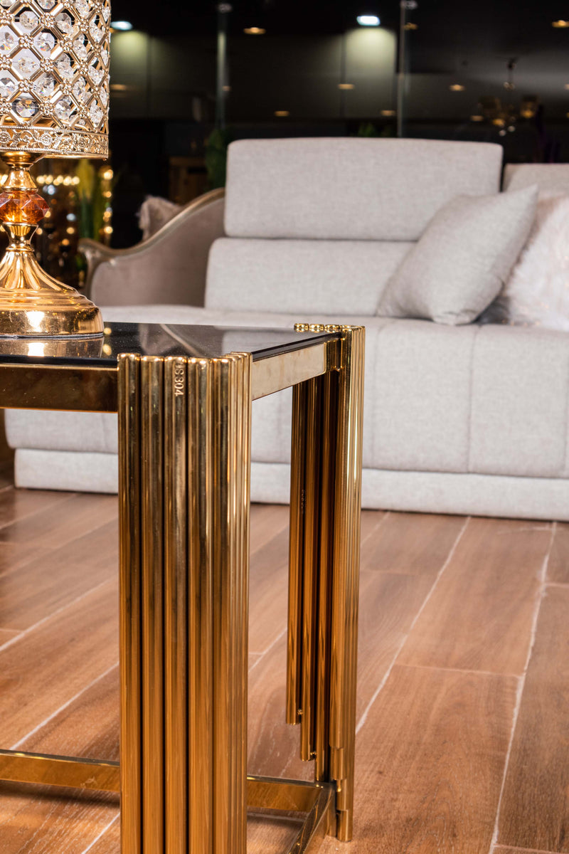 Piano stainless steel side table